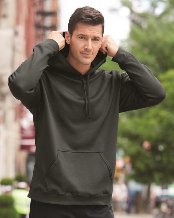 Model Wearing Gildan Performance Tech Hooded Pullover Sweatshirt 99500